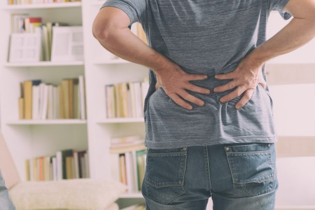 Man suffering from low back pain